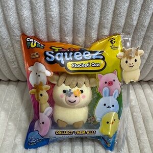 TabaSqueez Flocked Cow squishy. New. Bag not opened.